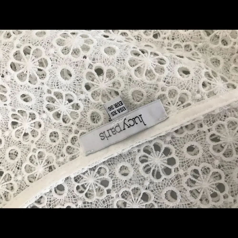 Lucy Paris eyelet top NWOT
